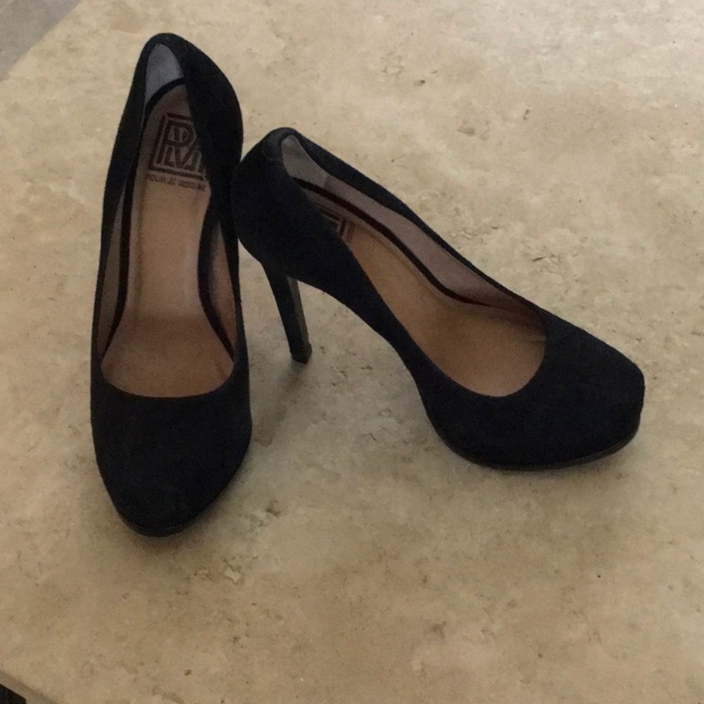Black platform pumps